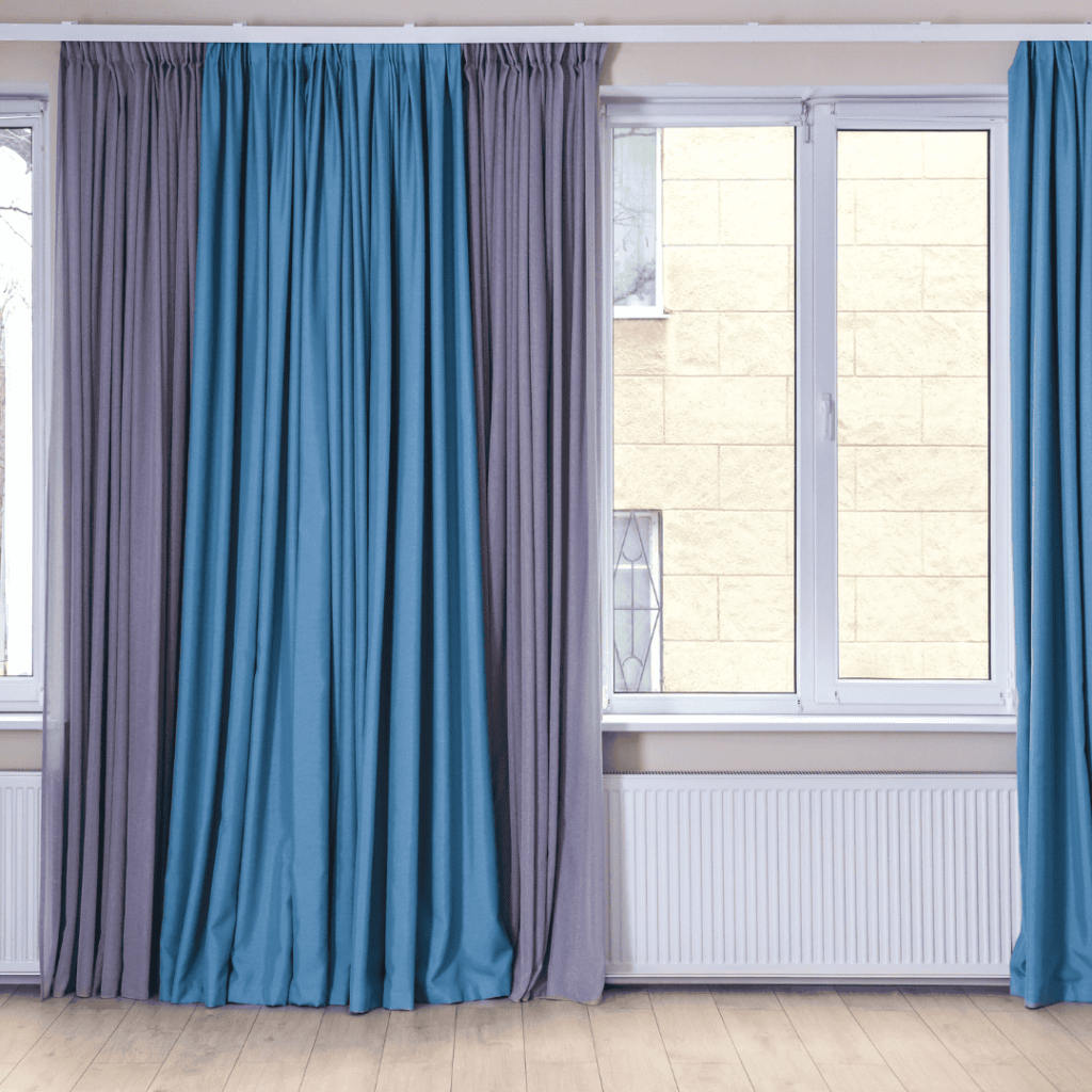 Thick curtains being used to help keep house warm during the winter
